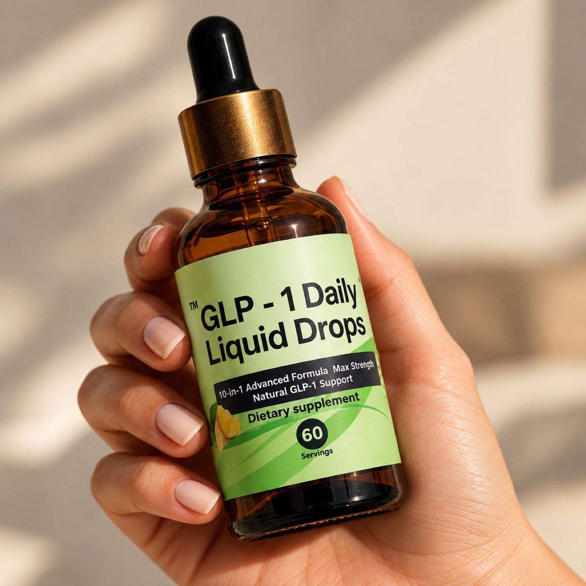 Hand holding a bottle of GLP-1 Daily Liquid Drops